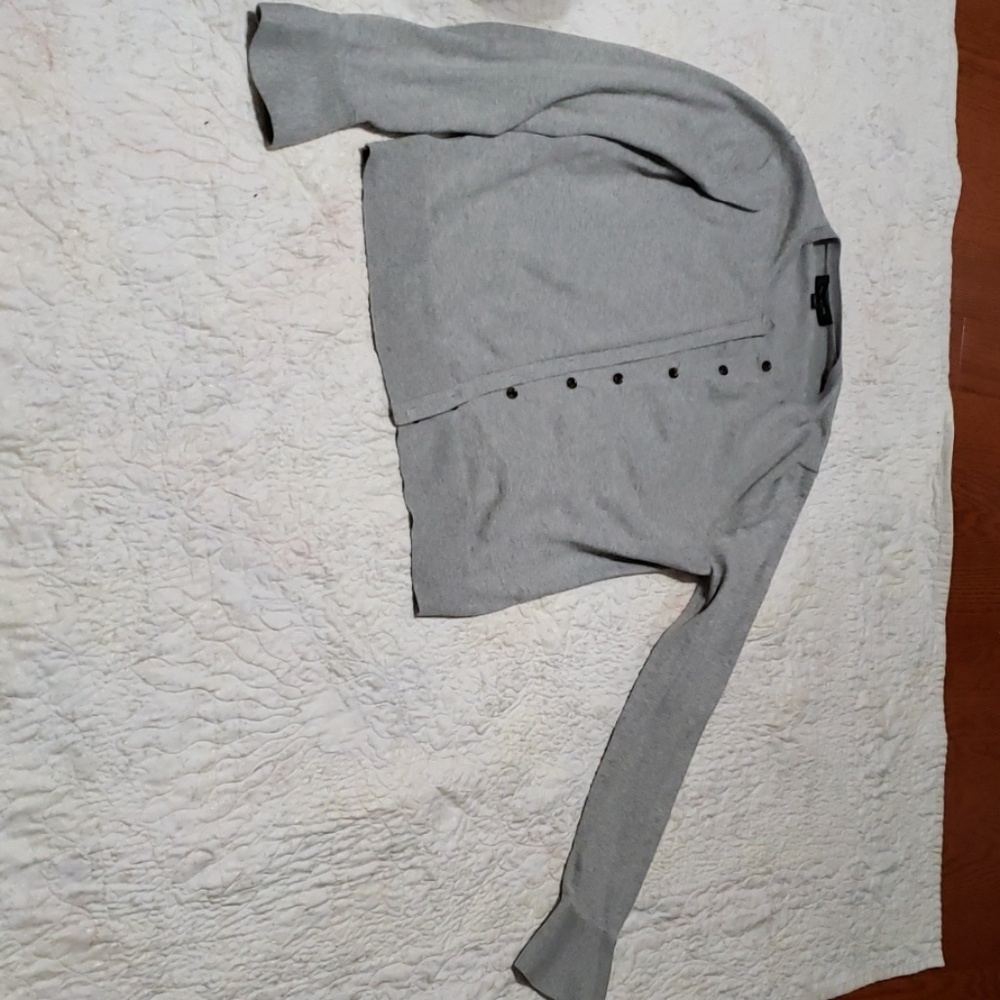 Gray sweater.